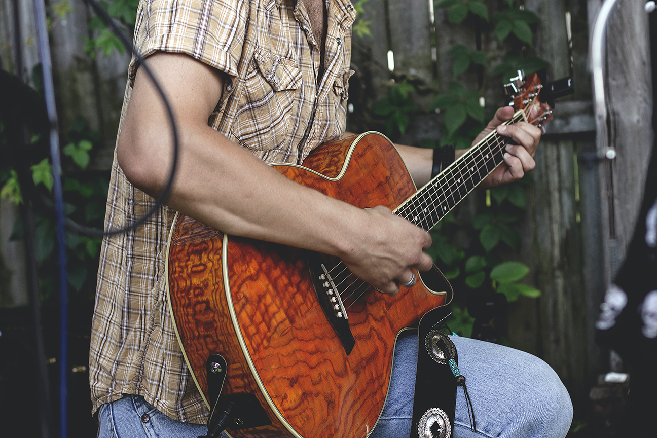 Man Playing Guitar