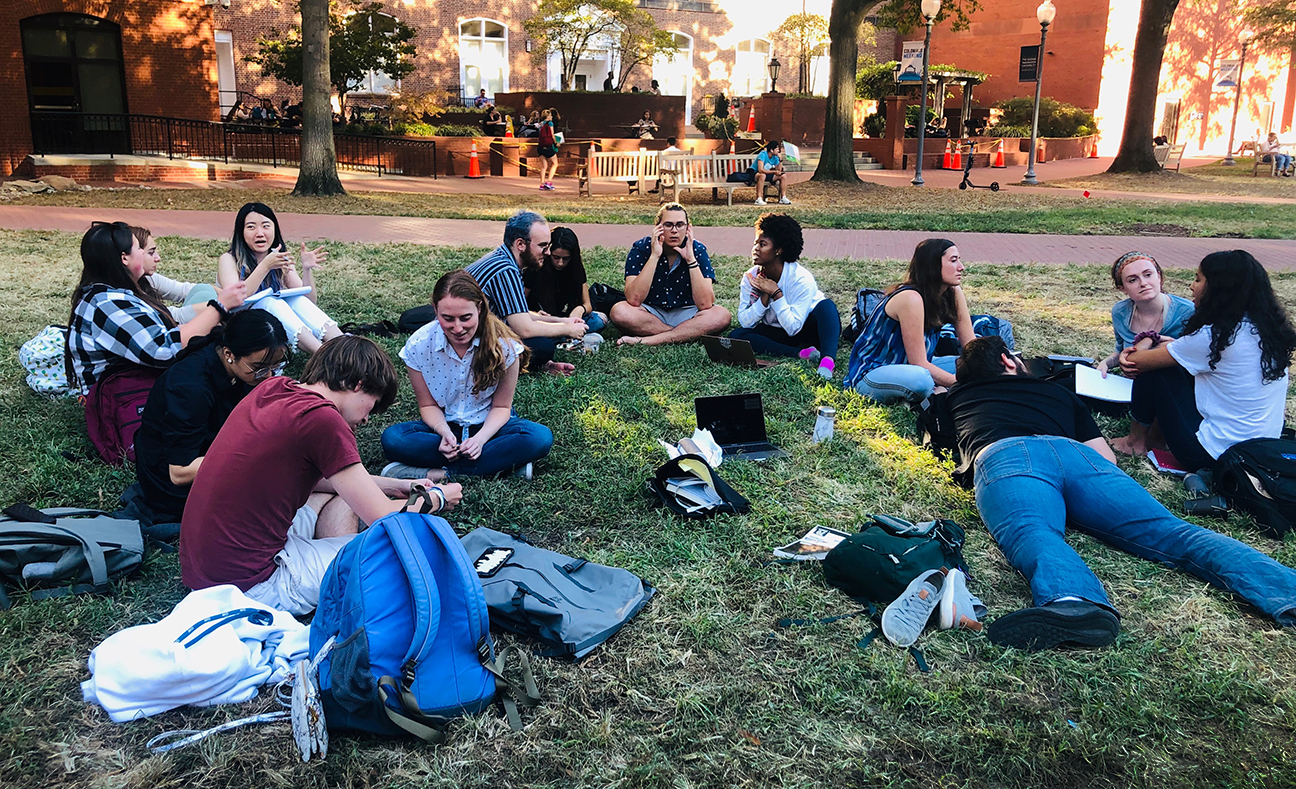 Students gathered in a circle at GWU